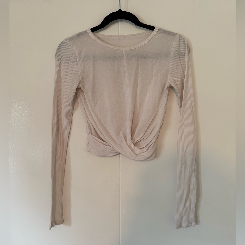 White Long sleeved Yoga top from ALO with the Crossover Hem, Size S